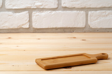 Wooden board for food on wooden background