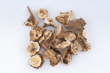 Dry Karela (Dried Bitter Gourd) Bitter melon For Ayurvedic medicinal use spreaded over isolated background