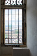 Looking out of a window at Bolsover Castle in Derbyshire, UK