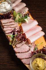 meat plate with sauce and lettuce