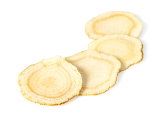 Close up of ginseng slices isolated on white background.