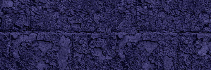Dark blue weathered wall wide texture. Old cracked peeling paint surface. Gloomy abstract grunge large banner background
