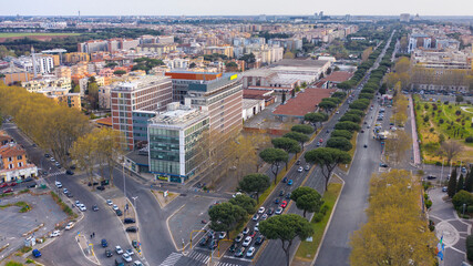 Aerial view of a road intersection on the Via Cristoforo Colombo in Rome, Italy. Many cars are in...