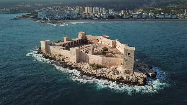 Kızkalesi, Maiden's Castle is a town in Mersin Province, Turkey. Aerial video.