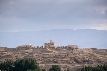 Fototapeta na wymiar View from Israel on monasteries and churches on the Jordanian part