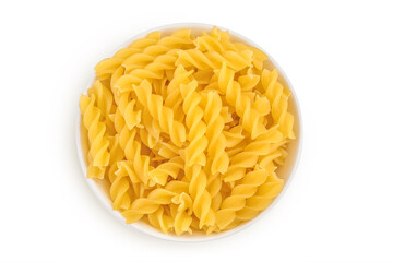 raw Fusilli pasta in ceramic bowl isolated on white background with clipping path and full depth of field. Top view. Flat lay
