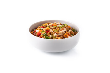 Lentil salad with peppers,onion and carrot in a bowl isolated on white background