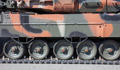 Military parade. Armored vehicle camouflage color, close up view. Army weapon for war and defense