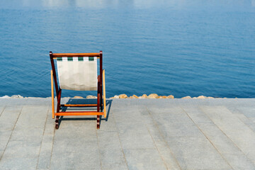 Deck chair on the lakeside