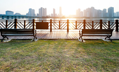 Empty bench by the sea