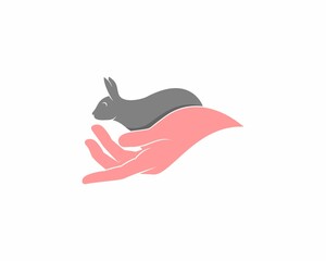 Rabbit on the hand care logo