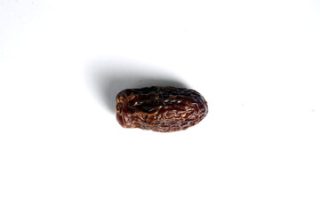 Fresh almonds in the wooden bowl, Organic almonds, almonds border white background, Almond nuts on a dark wooden background. Healthy snacks. Top view. Free space for text.