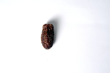 Fresh almonds in the wooden bowl, Organic almonds, almonds border white background, Almond nuts on a dark wooden background. Healthy snacks. Top view. Free space for text.
