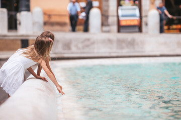 Little beautiful girls near fountain Fontana di Trevi - 495885748