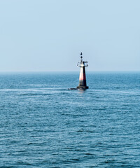 Fototapeta na wymiar Lighthouse on the sea