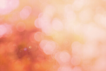 Abstract blurred orange color and peach for background, Blur festival lights outdoor and pink...