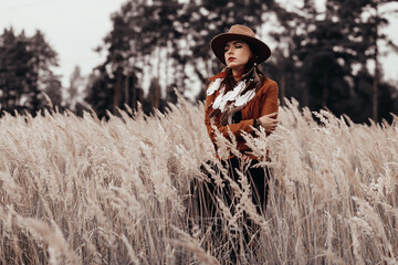 Bohemian, boho, gypsy, hippie style lady. Walk in nature in the forest, romantic mood of summer....