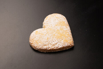 Shortbread in the shape of a heart isolated on white background.