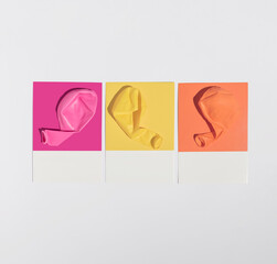 Obraz premium Minimal colorful vibrant party concept with three pink, yellow and orange birthday balloons. Modern summer aesthetic.