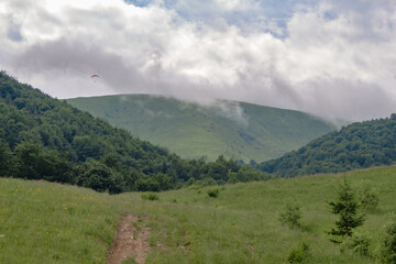 clearing in the mountains, horizon..