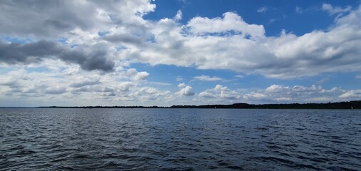 White clouds over the lake
