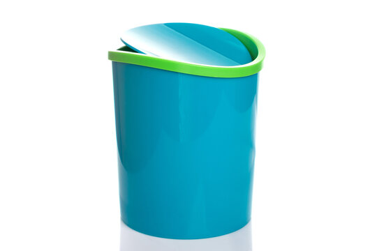 trash can of blue color with a lid made of plastic on a white isolated background
