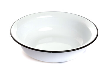 blue enamel bowl with a black border on a white isolated background