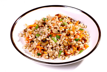 Easy bulgur pilaf (pilavi) with tomatoes in a ceramic bowl on a dark background close-up.