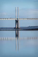 Obraz premium Kessock Bridge reflected in the Beauly Firth, Inverness, Scotland
