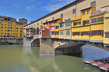 Fototapeta na wymiar colorful facade on a bridge- famous ponte vecchio in Florence, Italy above Arno river