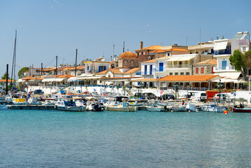 Fototapeta na wymiar Yachts in the sea on the background of the Greek island. close up