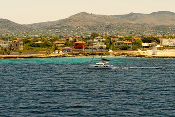 Yachts in the sea on the background of the Greek island. close up