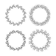 Fototapeta premium Set of floral round frames on a white background. Vector illustration.