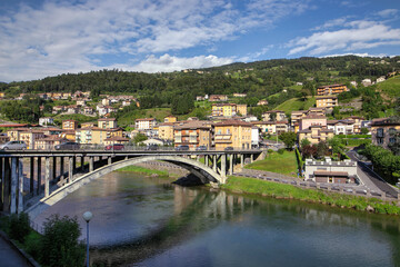 Fototapeta na wymiar Picturesque town on a mountain river in the mountains of Italy San Pelegrino