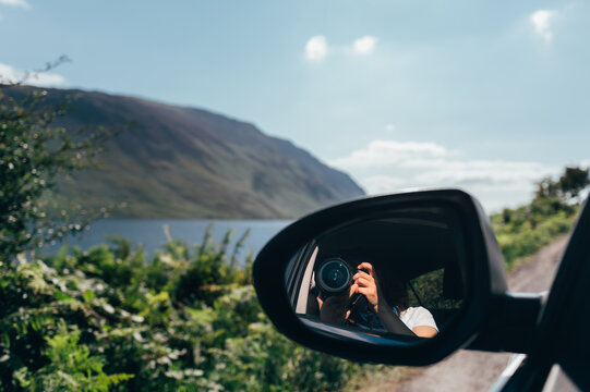 Photo camera in car window doing photo of Wast Water or Wastwater is a lake located in Wasdale, a valley in the western part of the Lake District National Park, England, UK