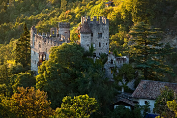 Castel Fontana/Brunnenburg has medieval origins but was rebuilt in neo-gothic style in the twentieth century. Tirol/Tirolo, Bolzano province, Trentino Alto-Adige, Italy, Europe. - obrazy, fototapety, plakaty