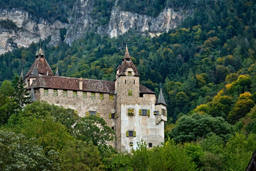 Fototapeta na wymiar The imposing medieval walls of Enn Castle. Montagna/Montan, Bolzano province, Trentino Alto-Adige, Italy, Europe.