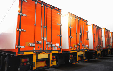 Rear of Containers Trailer Trucks Parked Lot. Safety Locked  Shipping Container Door. Lorry....