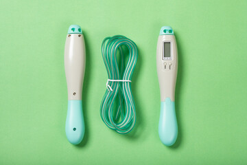 top view skipping rope with digital counters on green background