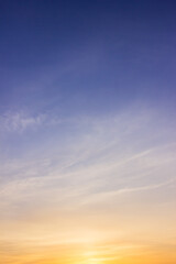 Naklejka na ściany i meble sunset sky vertical with sunlight clouds