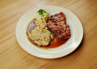 barbecue roast pork with mashed potatoes and fried onions