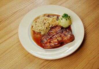 barbecue roast pork with mashed potatoes and fried onions