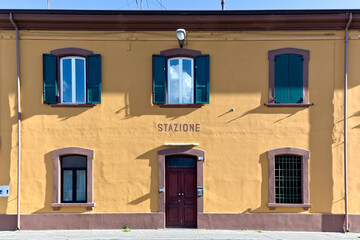 Fototapeta na wymiar Brescello: the railway station used to shoot the Don Camillo movies. Brescello is famous for the films of Don Camillo and Peppone. Reggio Emilia province, Emilia Romagna, Italy, Europe.