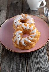German crullers with sugar icing. Traditional 