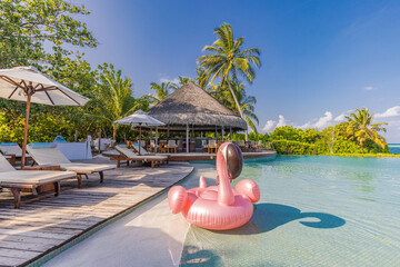 Summer tourism swimming pool inflatable pink flamingo, luxury resort hotel poolside. Happy cloudy...