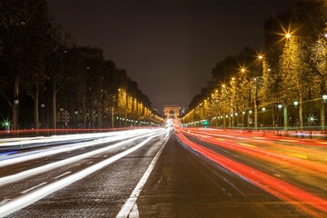 Avenue of Paris at night with traffic lights. France.
Avenue des Champs-Elysees, leading to the Arc...