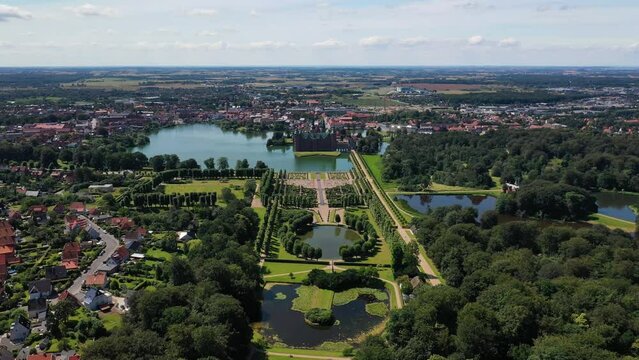 Aerial View Of Frederiksborg Castle, Park, Lake, And Garden In Hillerod, Denmark. - pullback