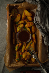 Baked potato wedges with barbecue sauce