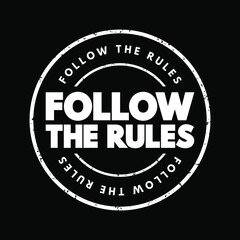 Fototapeta premium Follow The Rules text stamp, concept background