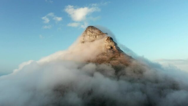 Clouds Enveloping Lions Head Peak In Cape Town, South Africa. Aerial Shot